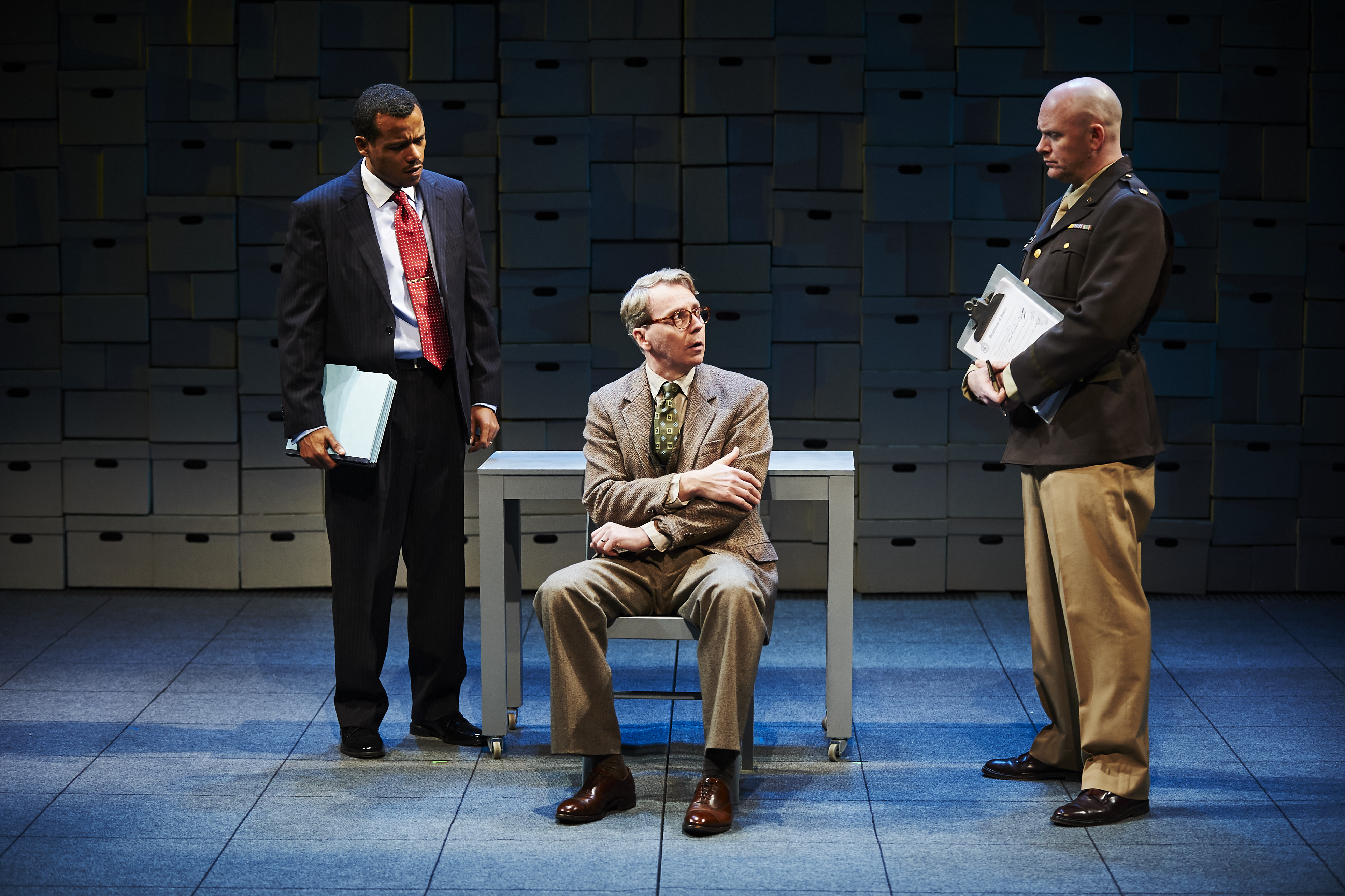 It is not looking good for ex-Nazi Arthur Rudolph (Jonathan Tindle, center) in City Theatre's new production, although the play is called "Some Brighter Distance."