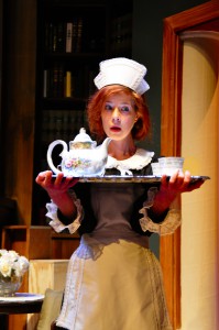 Don’t drop the china! In a romp that requires a fine balance, maid Edith (Karen Baum) teeters madly around the edges of the upper-crust bedlam.  