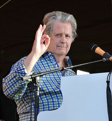 Brian Wilson gives the OK sign and a smile while performing as part of The Beach Boys 50th Anniversary Reunion at the New Orleans Jazz & Heritage Festival 2012. photo: Takahiro Kyono, Wikipedia.