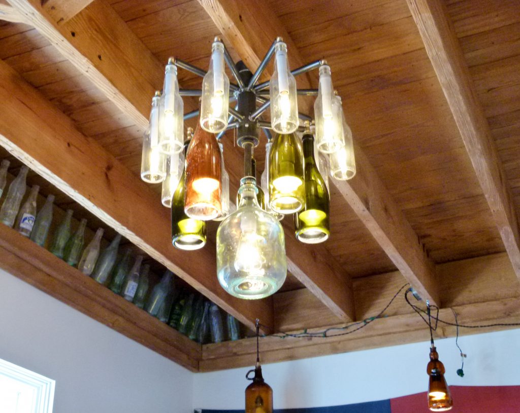The restaurant features some creative lighting fixtures. Notice the light in the background made from an old maple syrup bottle.