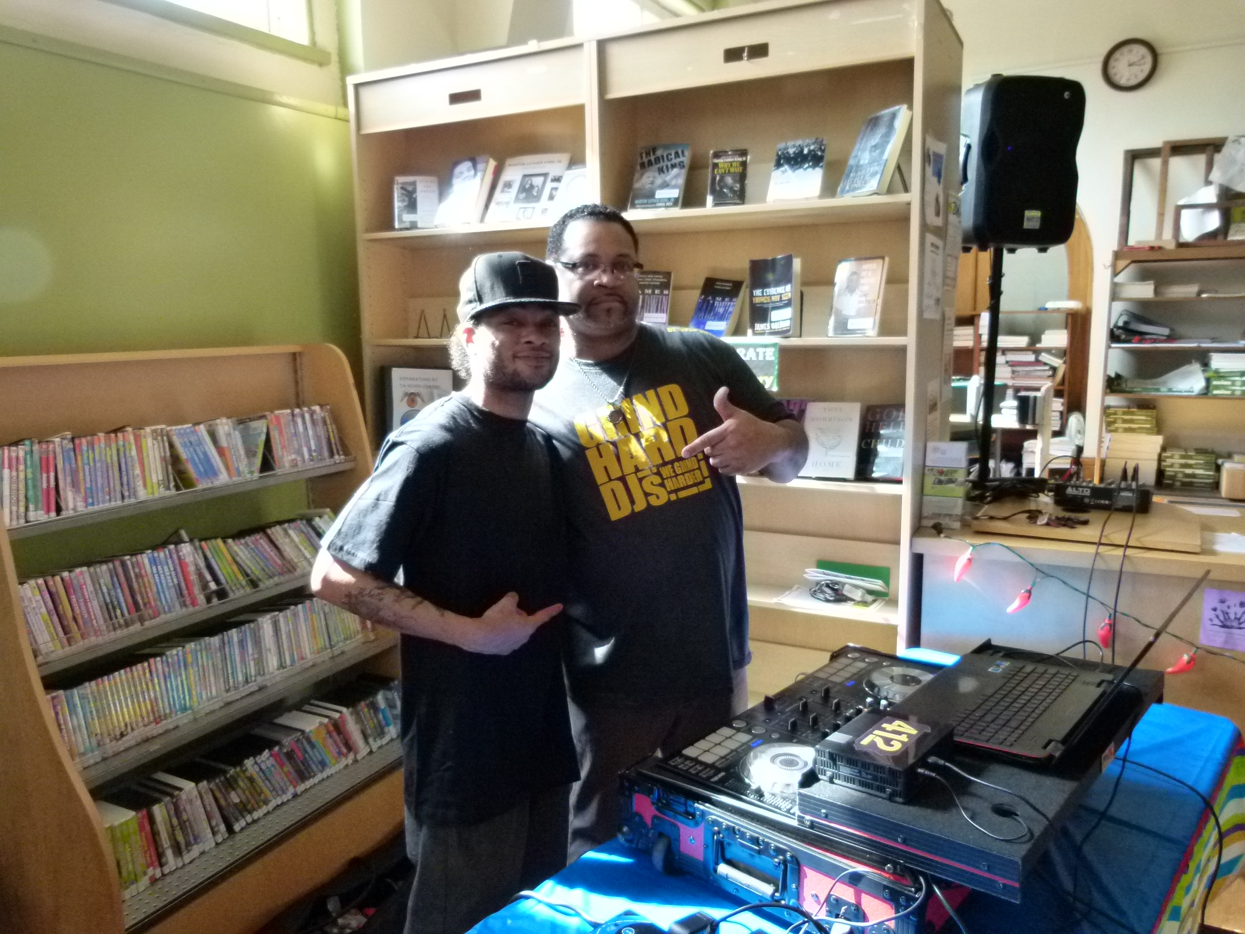 DJ Wyld Chyld (Sean Walker) (l.) and his protege Terance Boddy (r.) create the music mix for the event.