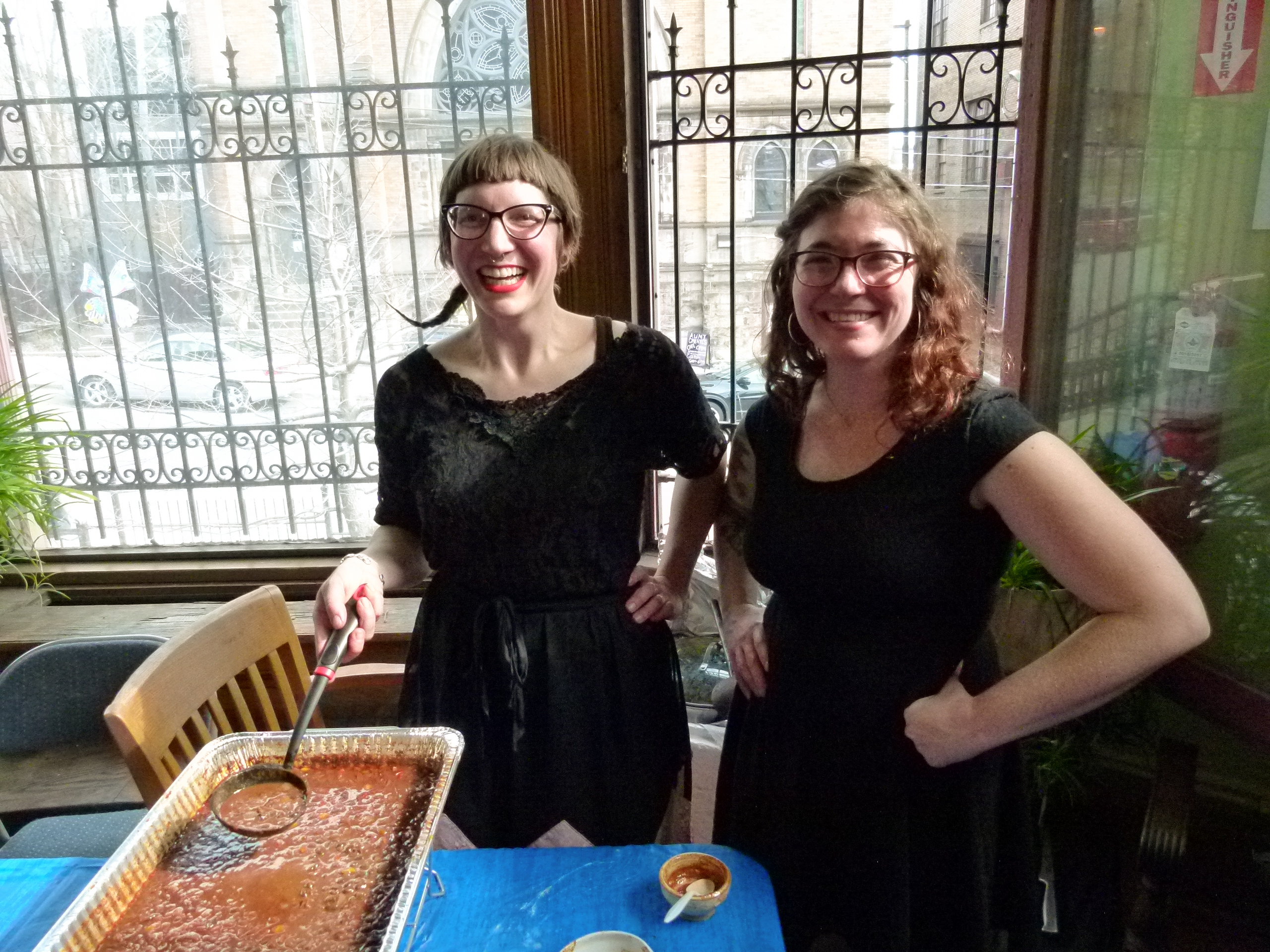 Hipsters make great chili too. Grizzemily (l.) is ready to scoop some of their Holy Mole! chili into a bowl while Katie Johnson (r.) stands ready to assist.