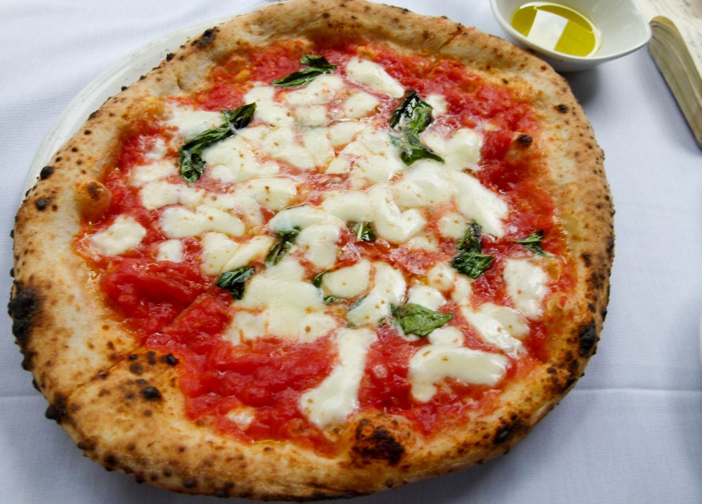 Legend has it that Margherita pizza's red tomatoes, green basil, and white cheese symbolize the colors of the Italian flag and that the pie was named after Margherita of Savoy, the Queen of Italy.