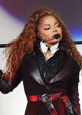 Janet Jackson preforming in concert this year on her State Of The World Tour. Photo: Jai1814 and Wikipedia.