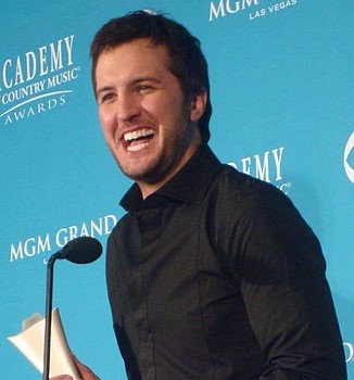 Luke Bryan accepting an award from the Academy of Country Music. photo: Keith Hinkle, w.c.c.
