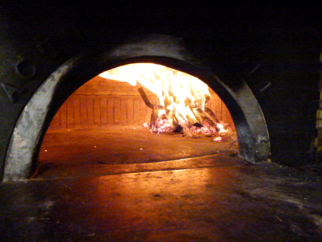 Interior photo of the wood burning oven.