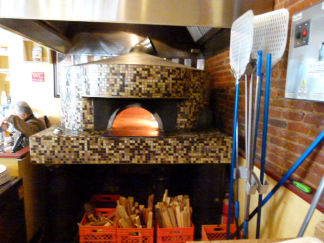 Authentic, wood-burning pizza oven.