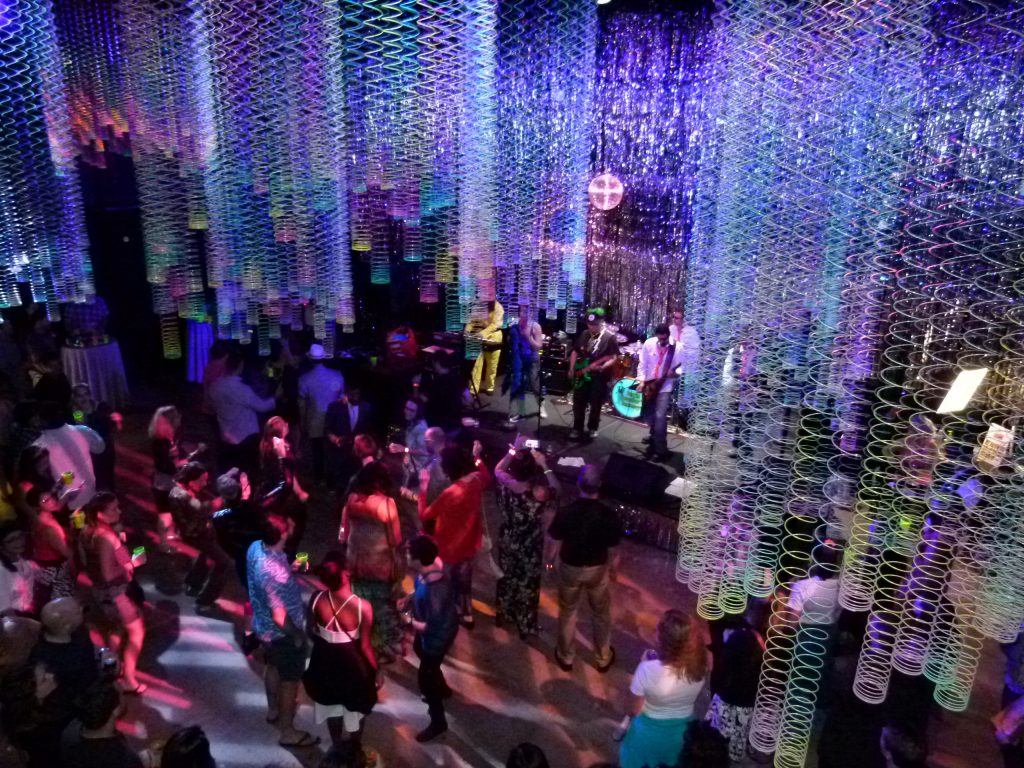 Ferris Bueller's Revenge! played the 80's room, which was creatively decorated with multi-colored Slinkys, as people danced.