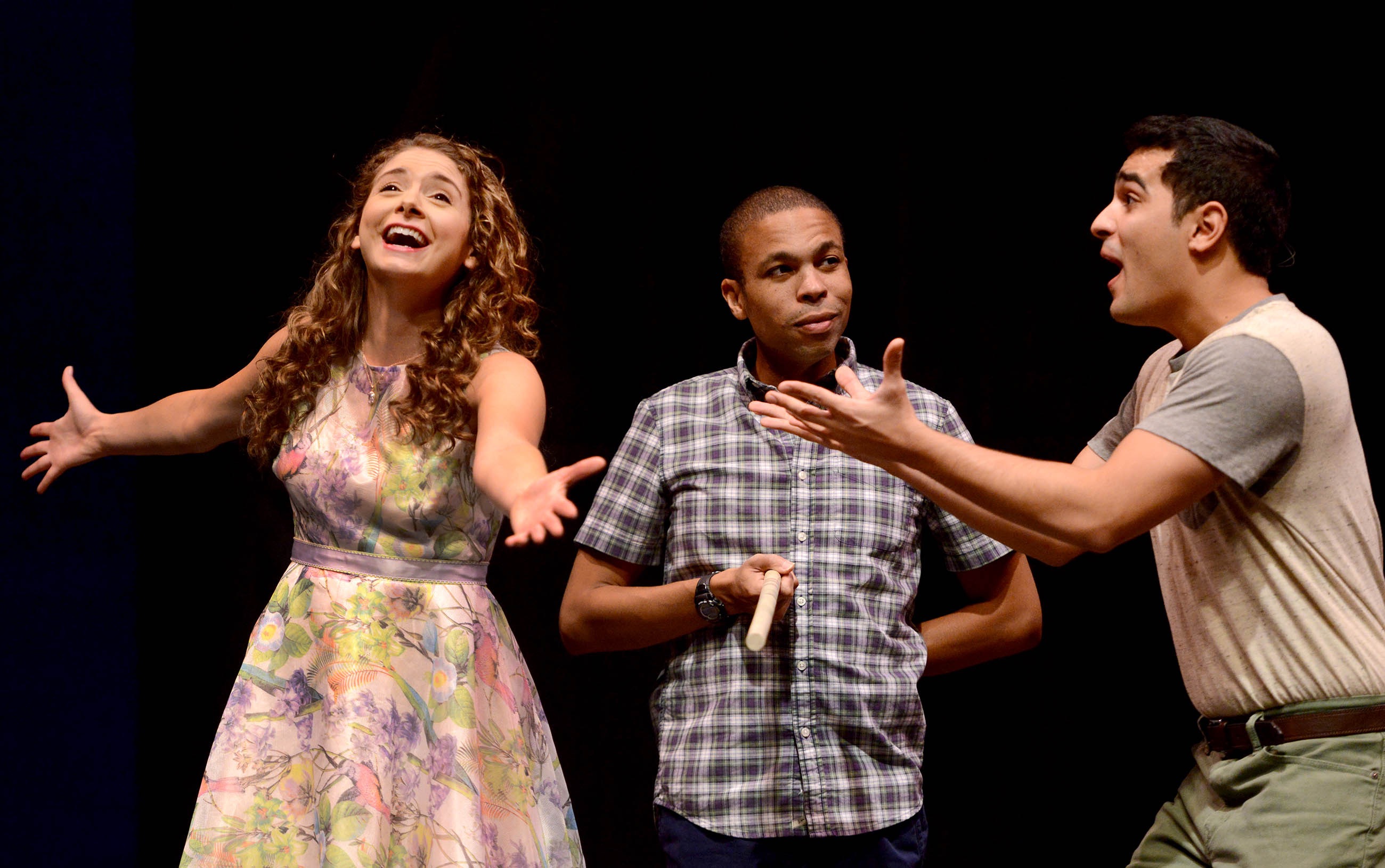 So simple and yet so puzzling: Jason Shavers (center) says it all with a look while Mary Elizabeth Drake and Jamen Nakthakumar expound in "The Fantasticks."