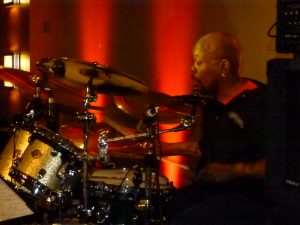 The Houserockers' drummer Jeffrey "Joffo" Simmons with his sticks a blazin'.