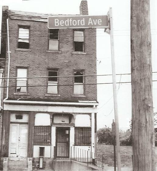 August Wilson's boyhood home, in disrepair in this undated photo, is being restored as a neighborhood arts center. The backyard staging of "Seven Guitars" will wake echoes of the scene in Wilson's day.