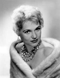 This old studio portrait of Judy Holliday clearly shows the inner spark outshining the glitz. 