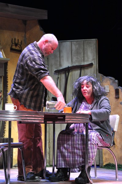 Don’t let the haggard look fool you. Maryjohnny (Sharon Brady) is sharp as a tack and she’s getting free drinks from Mick.