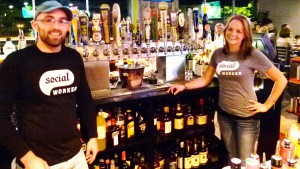 Social bartenders (l. to r.) Adam James and Stephanie Santoro., ready to pour a draft or mix a drink.