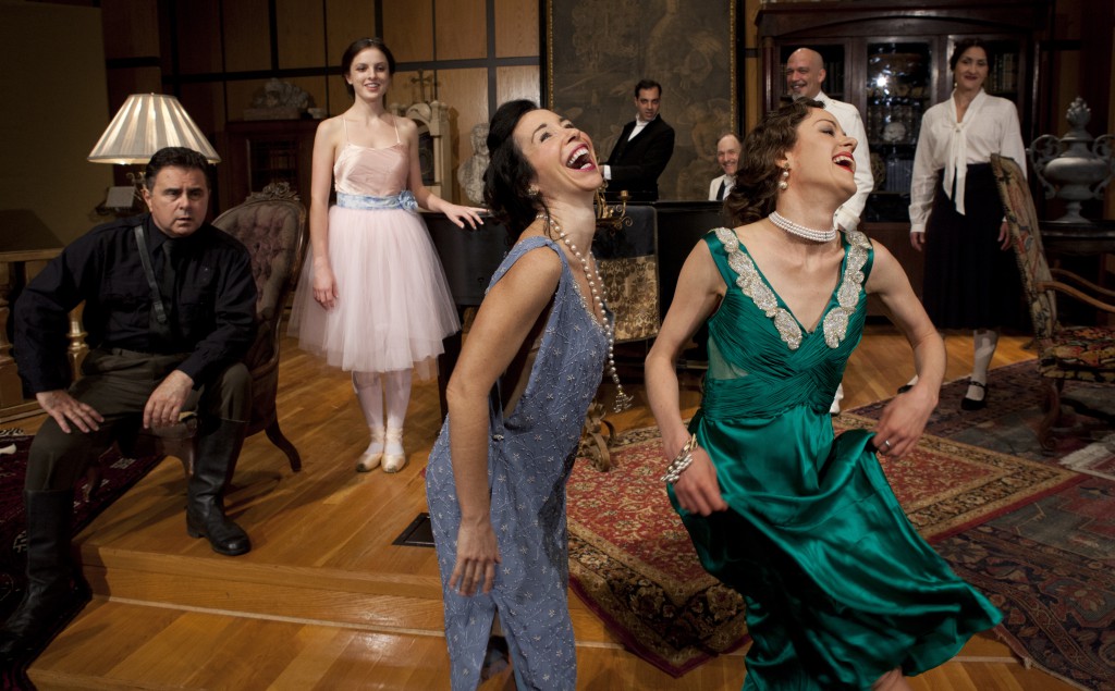 Tamara (Megan MacKenzie Lawrence, right front) promotes cultural exchange by teaching Luisa (Robin Abramson) how to shimmy.  