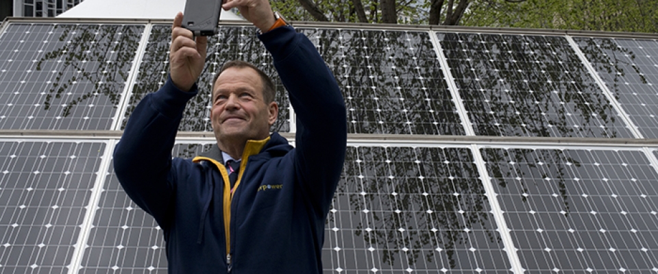 Robert Swan snaps a selfie with the solar panels on display at the EverPower Earth Day Festival. Swan, an advocate for renewable energy and the protection of Antarctica, is the first person to walk to the North and South Poles.