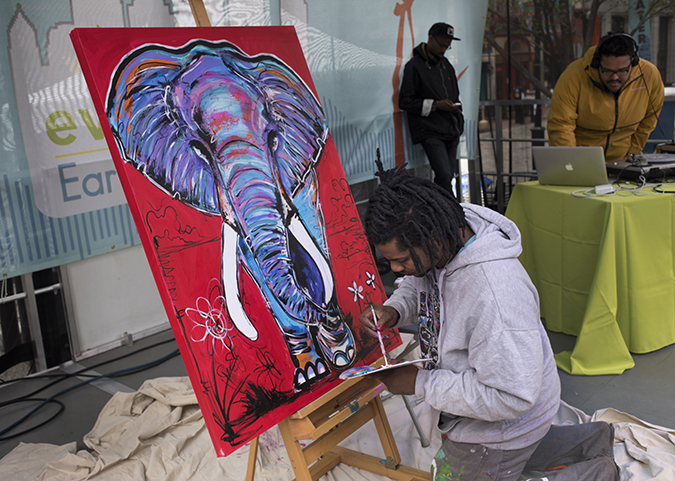Baron Batch paints a mighty pachyderm while a DJ from the Pittsburgh collective Detour provides the beats. The painting was later auctioned to benefit Tree Pittsburgh.