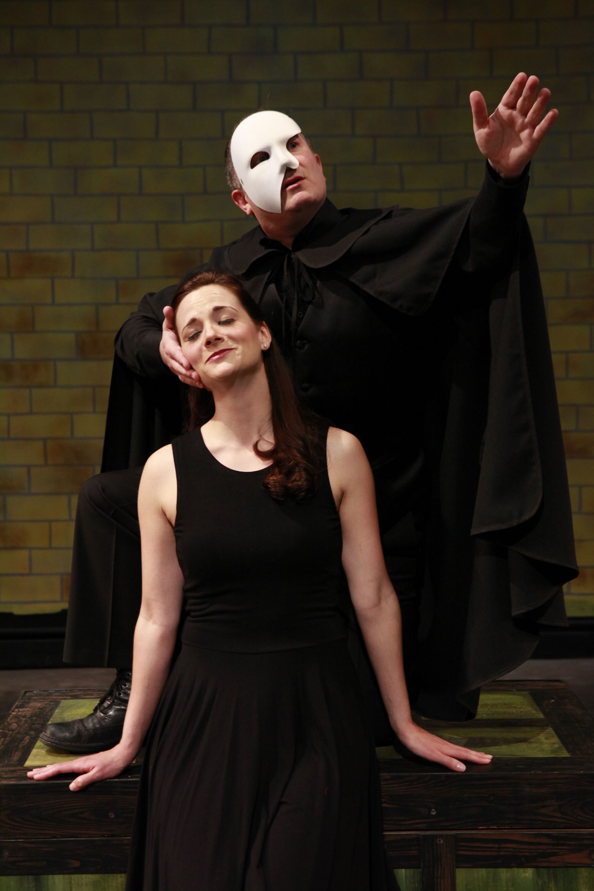 The Phantom stalks; the musical mocks. Gavan Palmer (masked) and Brittany Graham send up Andrew Lloyd Weber in "The Musical of Musicals (The Musical!)"