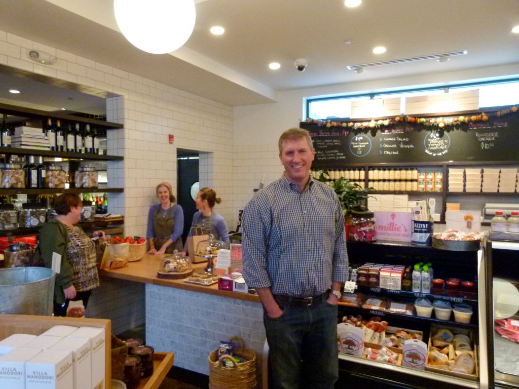 Brooks Broadhurst proudly smiles in Block 292's market section.