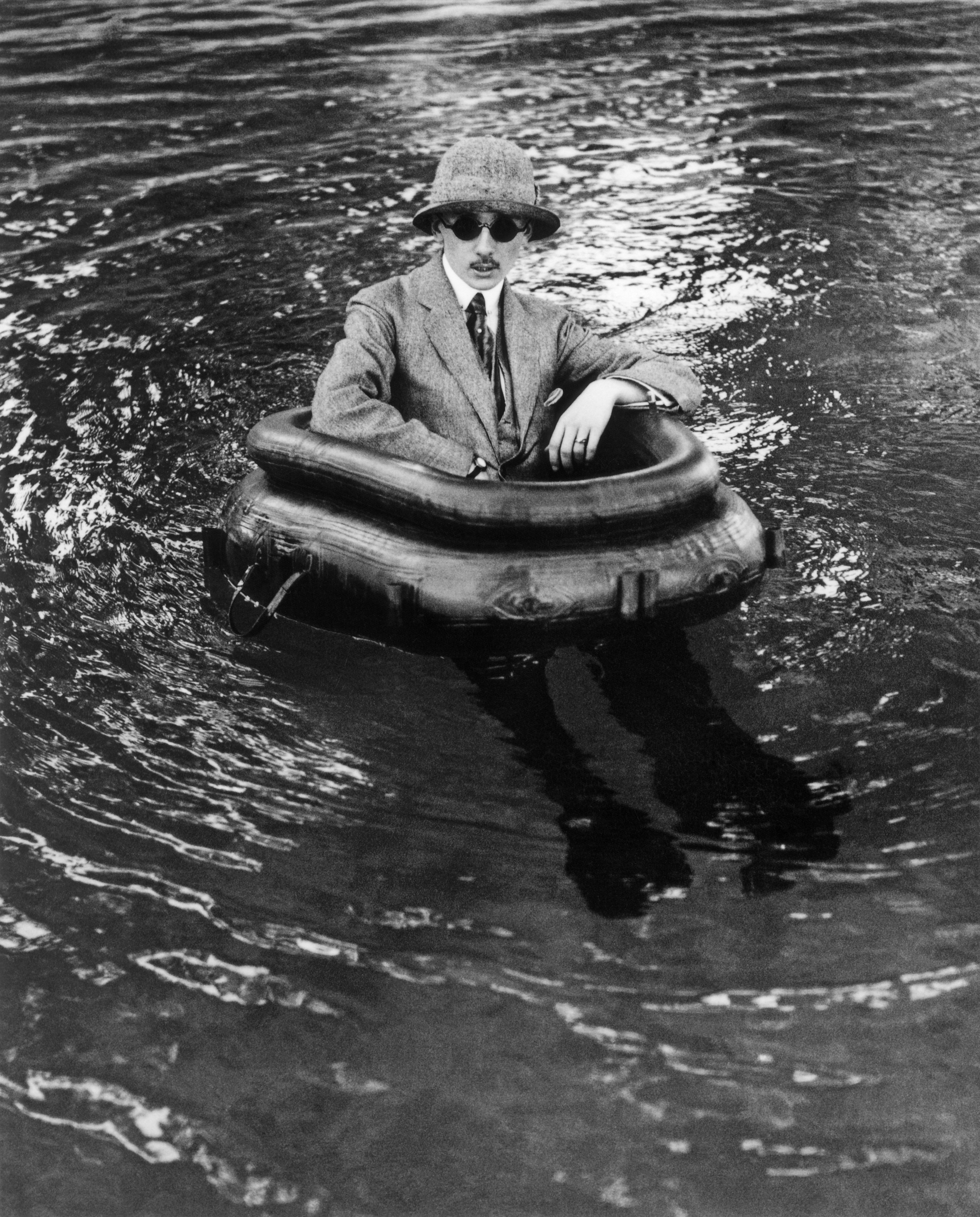 The state-of-the-art gentleman stays high and dry: Lartigue's brother Maurice, nicknamed Zissou, in a high-tech flotation device with rubber boots.