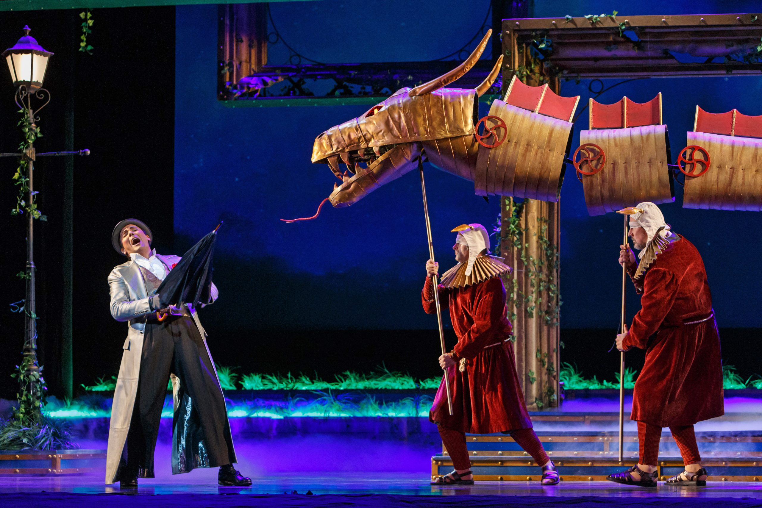 Prince Tamino (David Portillo) recoils from a dragon attack in Pittsburgh Opera's 'The Magic Flute.' (photo: David Bachman Photography)