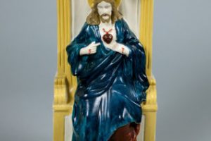 An early devotional work: Andy was between 10 and 13 years old when he painted this store-bought white plaster statue.