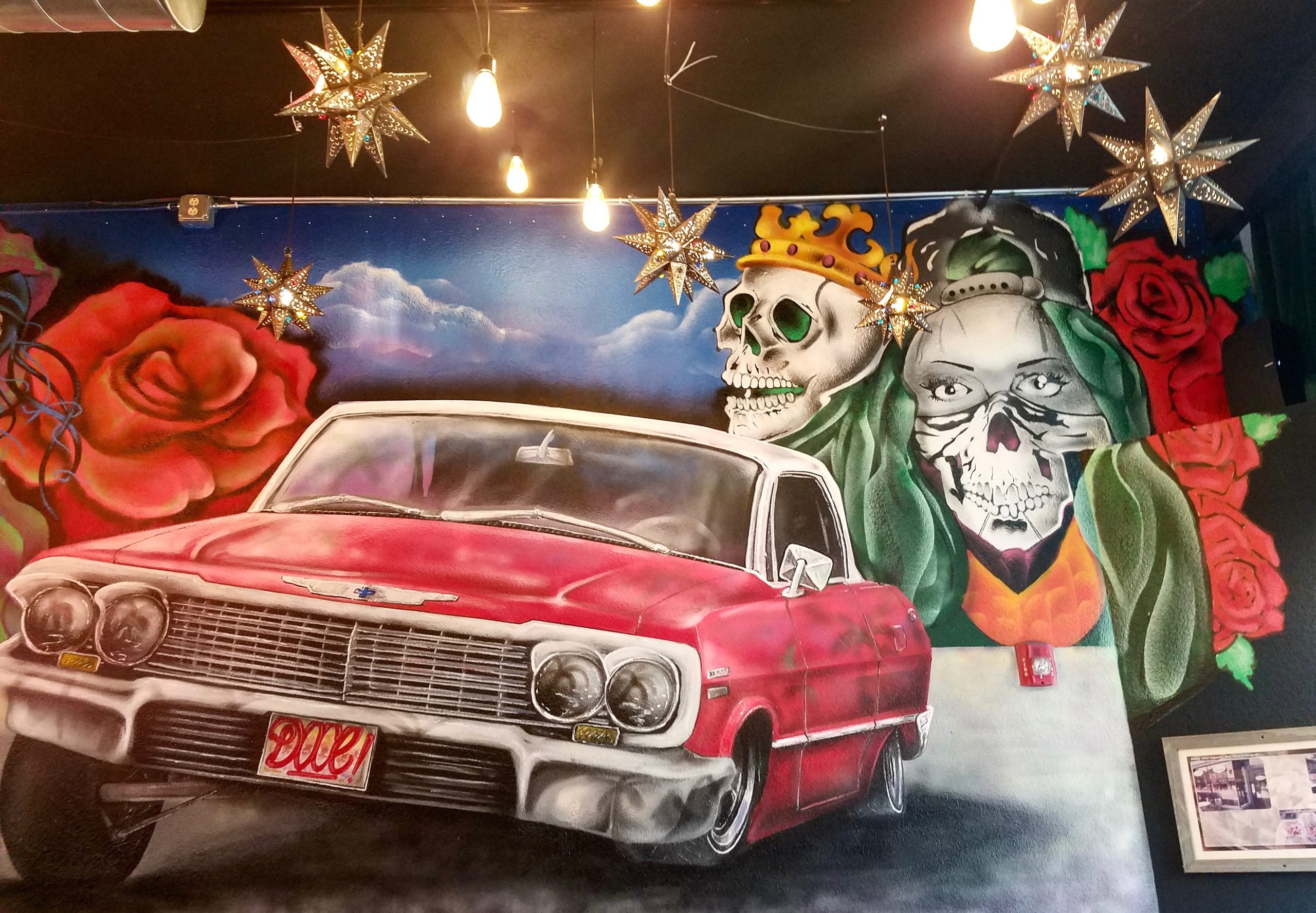 Apocalypse Not! This is taco imagery, adorning the wall at Doce Taqueria, a suggested spot for low-cost dining. (photo: Rick Handler)