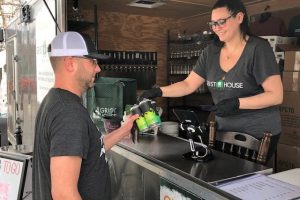 David Waruszewski of Shaler stocks up from Grist House bartender Jami Spatta.