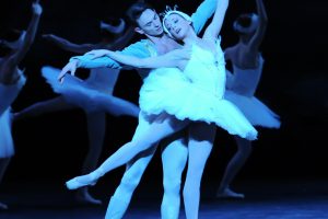 Alexandra Kochis as Odette and Luca Sbrizzi as Prince Siegfried.|Principal dancers Yoshiaki Nakano (Prince Siegfried) and Amanda Cochrane (pictured here as Odile).|'Dance of the Swans.'|White and black swans dancing together in 'Swan Lake.'
