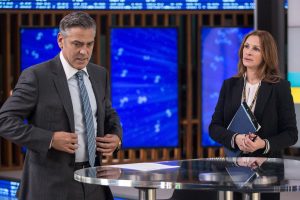 Julia Roberts and George Clooney have a pre-show chat before the taping of Clooney's show 'Money Monster.'|George Clooney (center) as Lee Gates dancing on his TV show set in TriStar Pictures' 'Money Monster.'