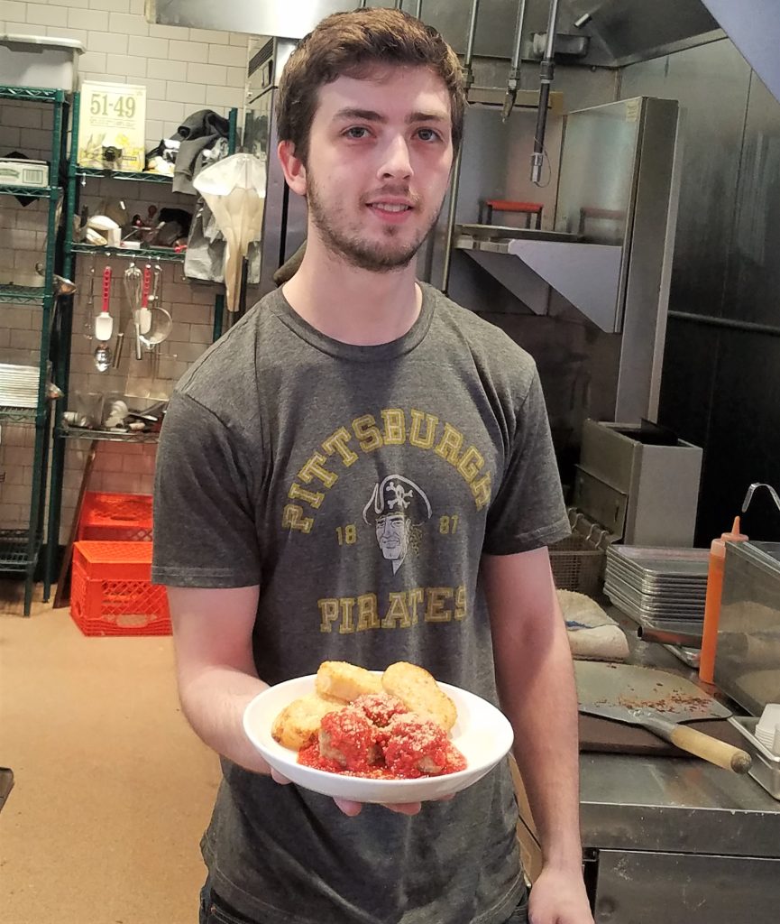 Jake Stewart proudly displaying Driven PGH's meatball plate.