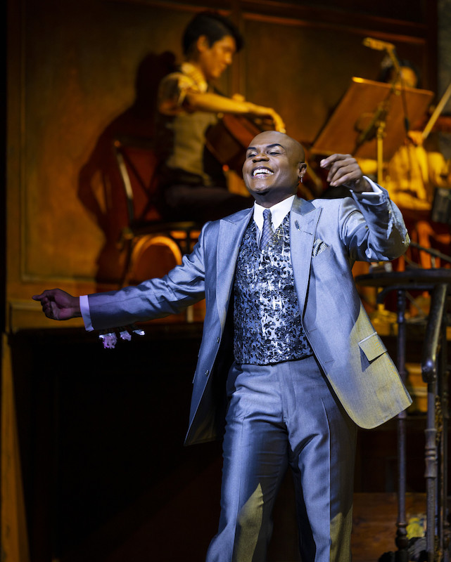 The flamboyantly dressed Hermes (Nathan Lee Graham) keeps the action moving in 'Hadestown.'