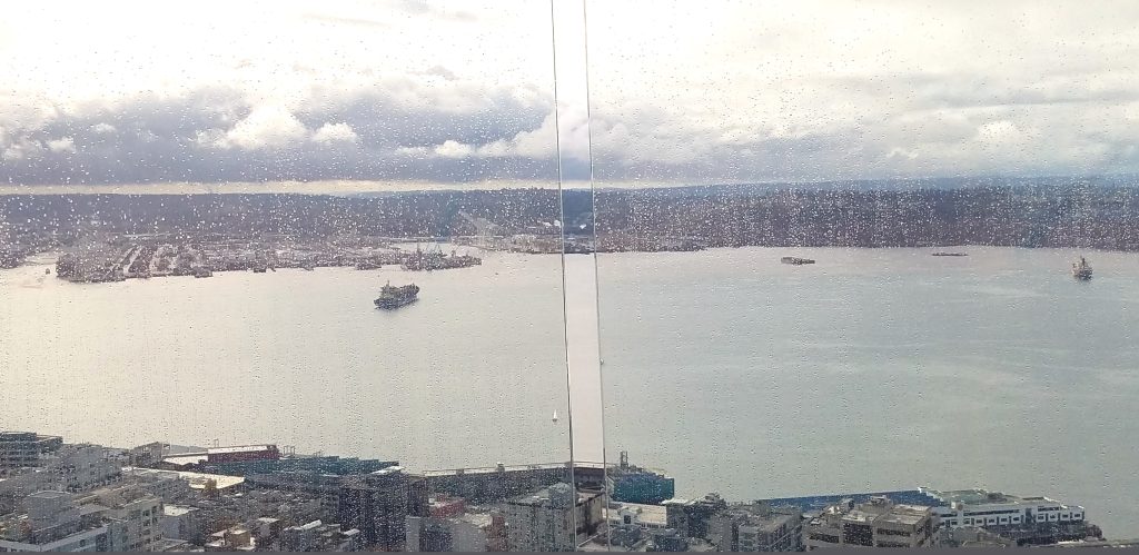 View from the outer deck of the Space Needle near downtown Seattle looking across Puget Sound to Bainbridge Island.