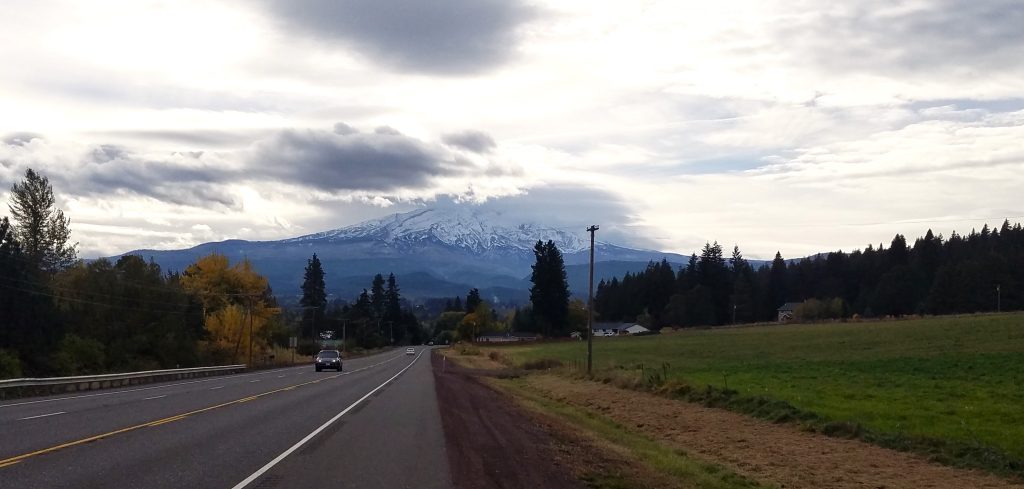 Mount Hood with its summit shrouded in clouds.