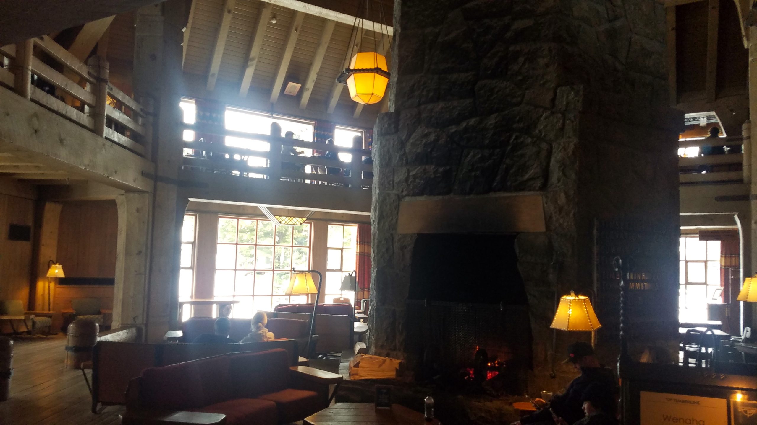 Timberline Lodge features a finely crafted lobby area with a large stone fireplace.