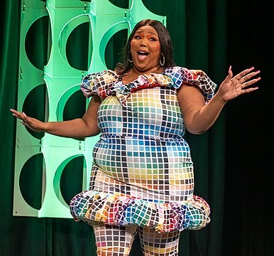 Lizzo performing at SXSW in 2022 and wearing a very colorful outfit. (Photo: Daniel Benavides)