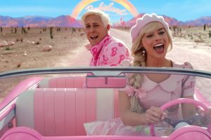 Barbie (Margot Robbie) and Ken (Ryan Gosling) singing together on a long road trip. (Photo: Copyright Warner Bros. Entertainment.)