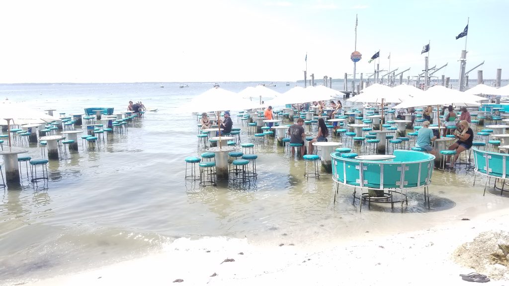 You can dine with your feet in the bay at Seacrets.