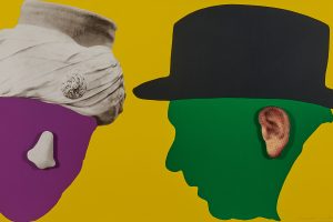 As a conceptual project, artist John Baldessari once burned his early paintings and had the ashes baked into cookies. But then he made artworks like this, now part of the special show at Carnegie Museum of Art. The title: 'Nose & Ears, Etc.: The Gemini Series: Two Profiles, One with Nose and Turban (B&W); One with Ear (Color) and Hat.' Image © John Baldessari and his estate, courtesy Sprüth Magers; photo: Sean Eaton.