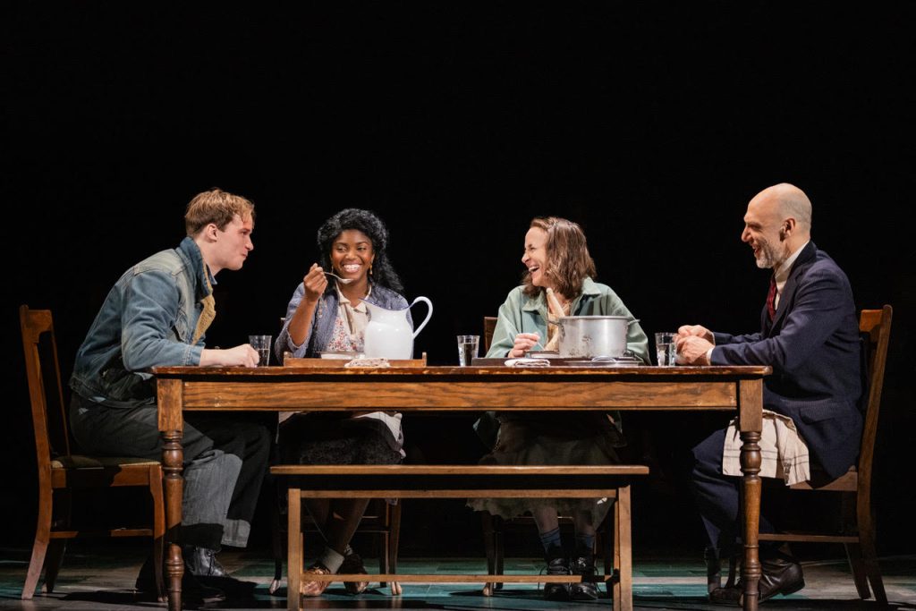 (L. to r.) Gene Laine (Ben Biggers), Marianne Laine (Sharaé Moultrie), Elizabeth Laine (Jennifer Blood), and Nick Laine (John Schiappa) dish up a moment of faith during the Depression.