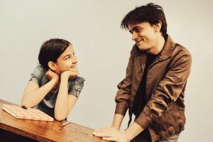 Anne Frank (Molly Frontz) shares a hopeful moment with friend Ed Silverberg (Ayden Freed) in Prime Stage Theatre's 'And Then They Came for Me ... Remembering the World of Anne Frank.' (photo: Laura Slovesko)