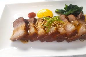 Pork belly appetizer at Pusadee's Garden. (Photo: Rick Handler)