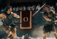 Some hot action as gladiators battle and swords are flying. Paul Mescal plays Lucius and Pedro Pascal plays Marcus Acacius.