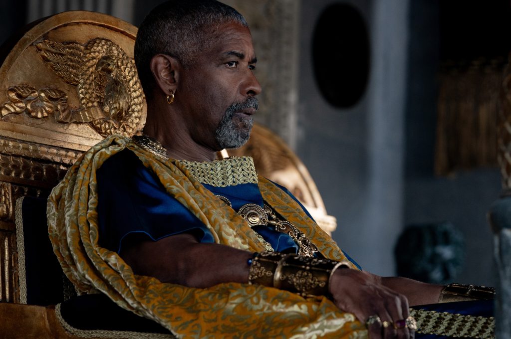 Denzel Washington plays Macrinus, a wise manager of the gladiators and an arms dealer.