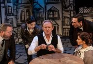 Bah! Humbug! Sherlock Holmes (David Whalen, center) is the toast of London but he's not feeling it. His concerned neighbors are played by (L to R) Simon Bradbury, Carolyn Jerz, Joseph McGranaghan, and Caroline Nicolian.