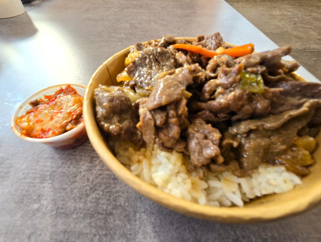 Bulgogi and rice with a side of Kimchi.