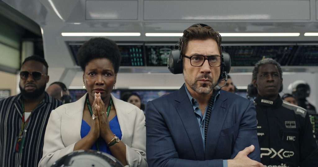 (L-r) Samson Kayo as Cash, Sarah Niles as Bernadette, Javier Bardem as Ruben Cervantes and Abdul Salis as Dodge are all concerned about what's happening on the race track. Copyright: © 2025 Warner Bros. Entertainment Inc. All Rights Reserved. Photo Credit: Photo Courtesy Warner Bros. Pictures / Apple Original Films.