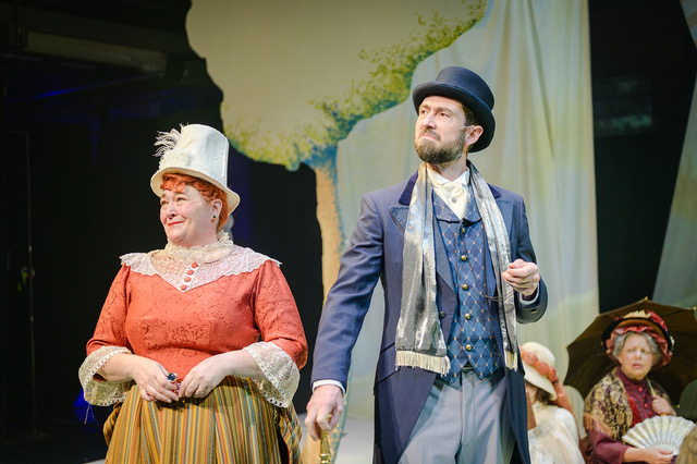 Yvonne (Becki Toth) and her husband Jules (Brad Smoak) appease the indifference of common folk while strolling on the I'lle de la Grande Jatte in Paris.