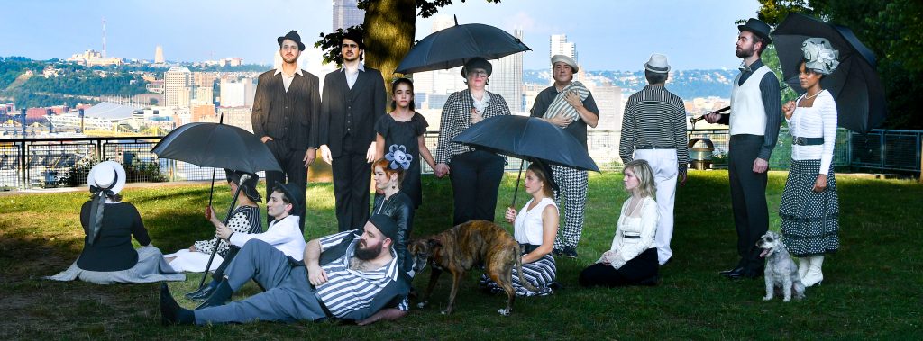The large cast of Front Porch's 'Sunday in the Park with George' seen here enjoying one of Pittsburgh's beautiful parks. (Photo by Deana Muro.)