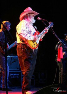 Charlie Daniels is highly skilled at both the fiddle and guitar.